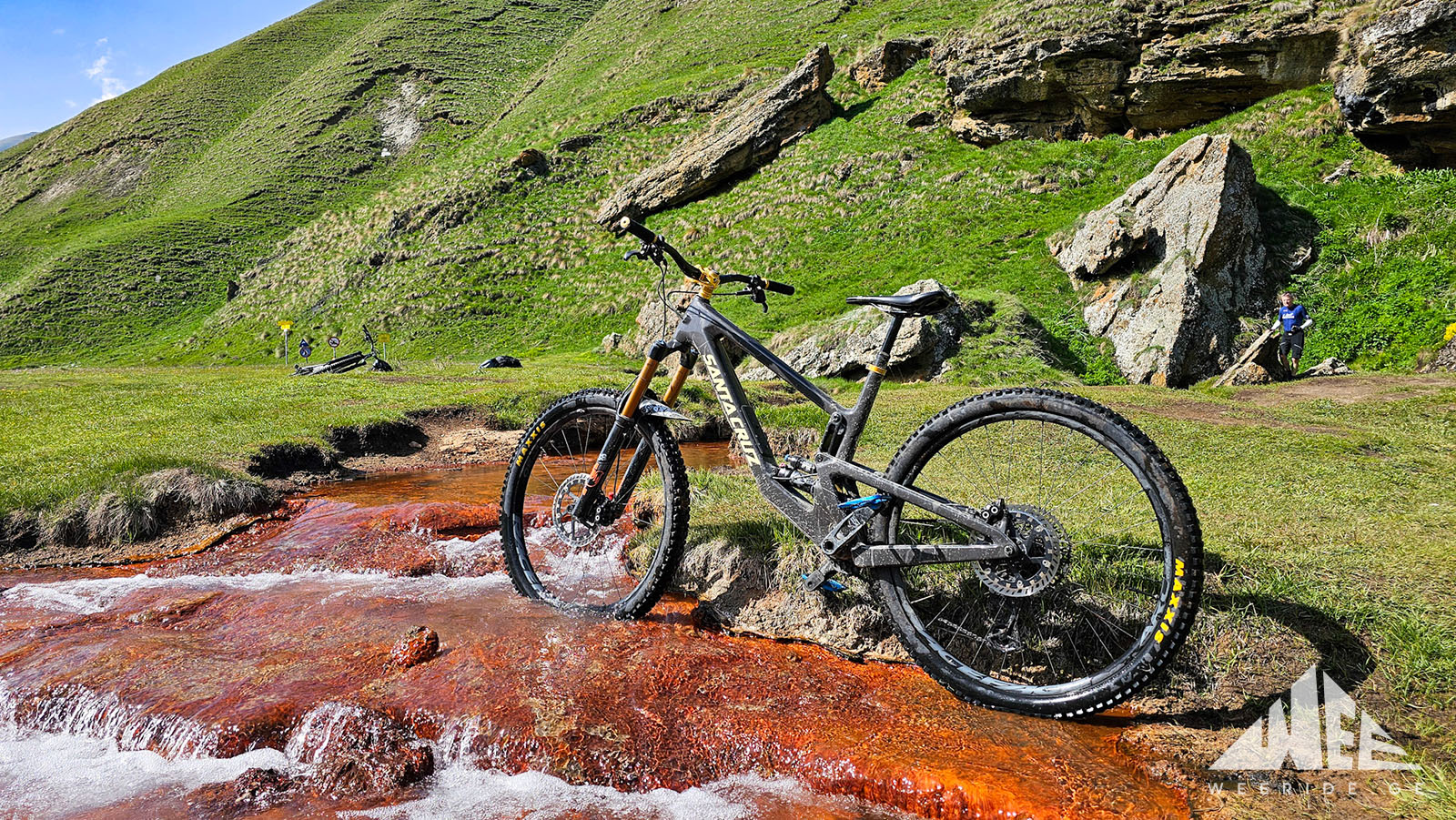 E-bike riders exploring Truso Valley through colorful rock formations and mountain landscapes in Kazbegi, Georgia