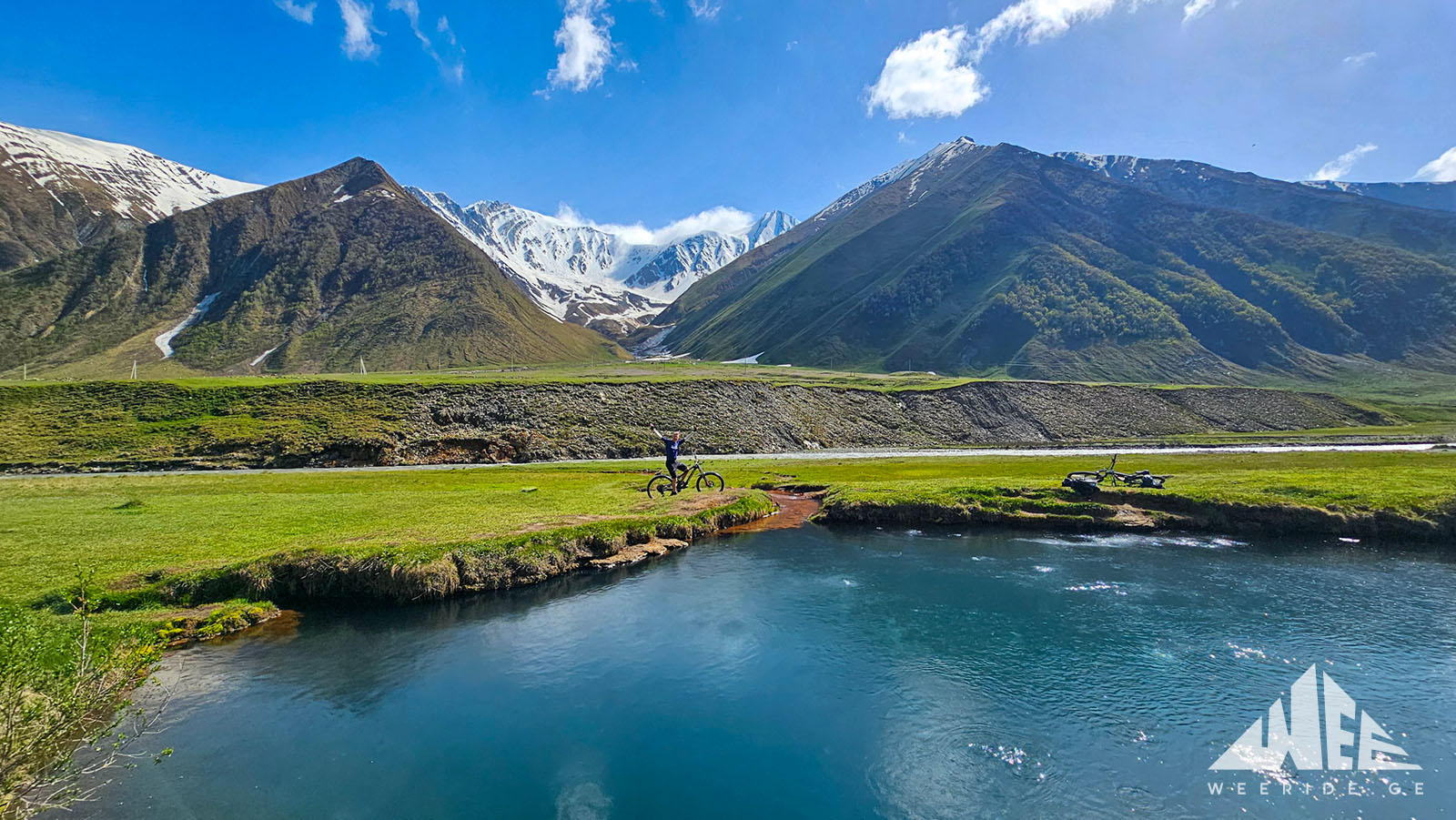 E-bike riders exploring Truso Valley on a mountain biking tour in Kazbegi, Georgia